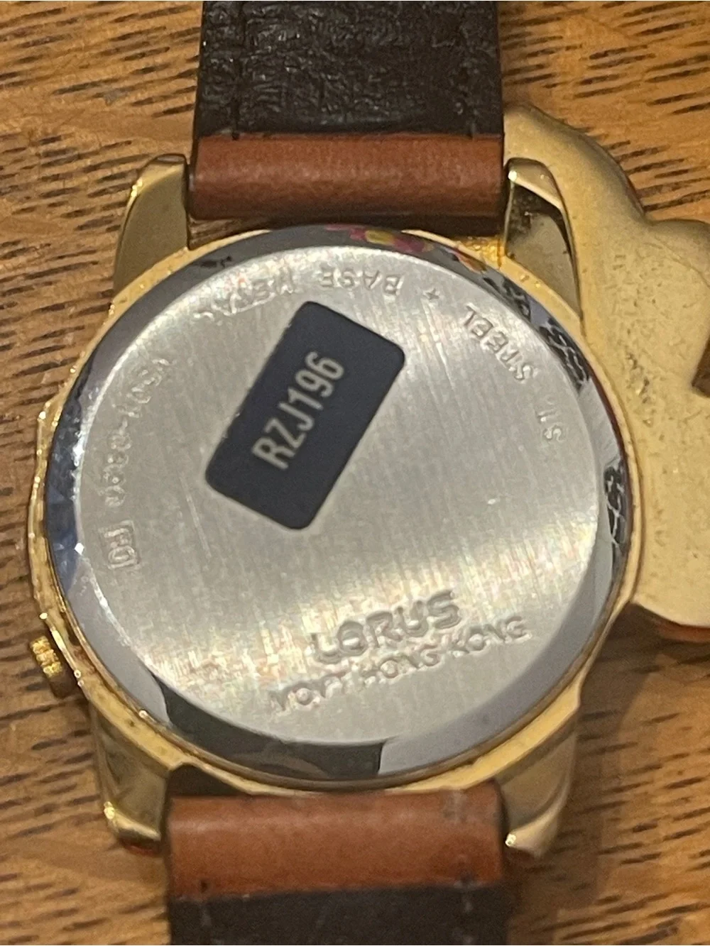 Vintage Lorus Minnie Mouse character watch featuring a distinct gold-tone Minnie